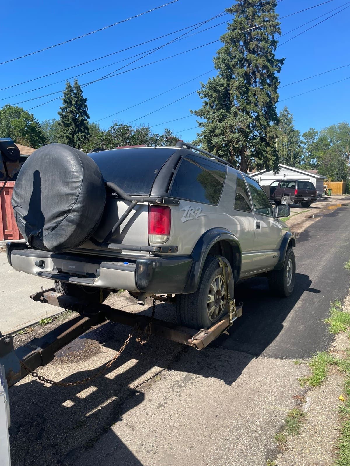 Older Chevrolet Blazer prepared for scrap SUV removal for pick and pull cash for cars service in Edmonton