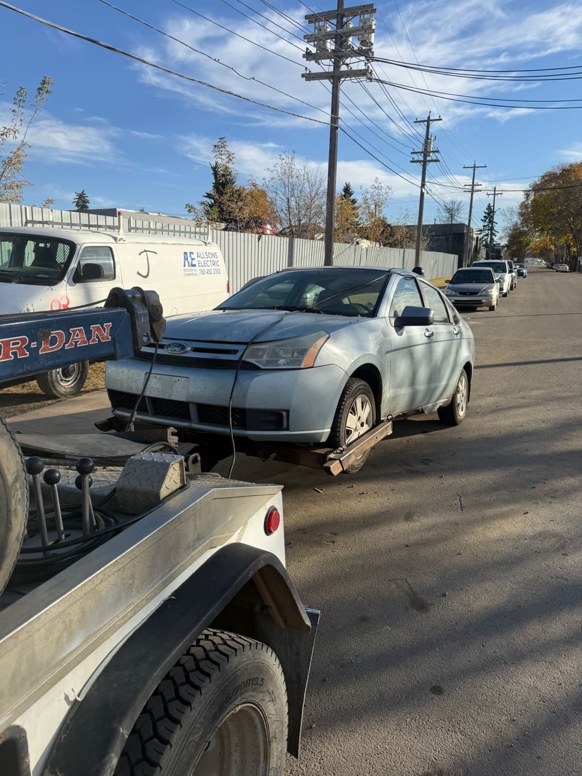 Older Ford Focus prepared for Leduc junk car removal and pickup