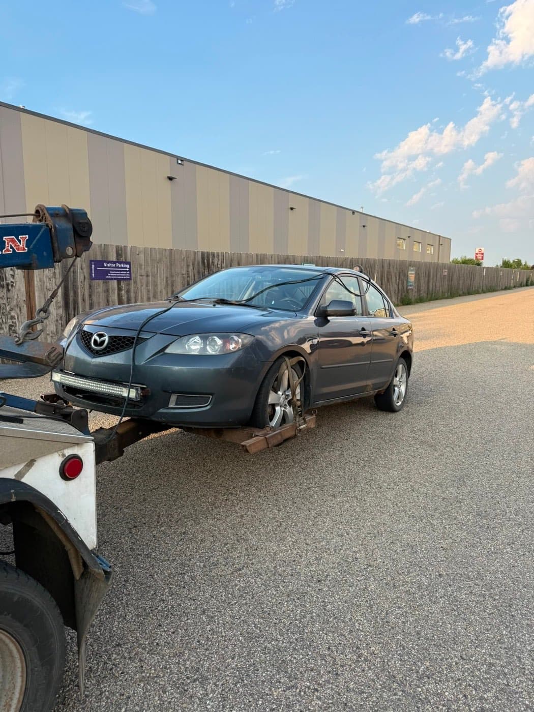 Dark grey 2005 Mazda 3 collected for cash in Westpark, Fort Saskatchewan
