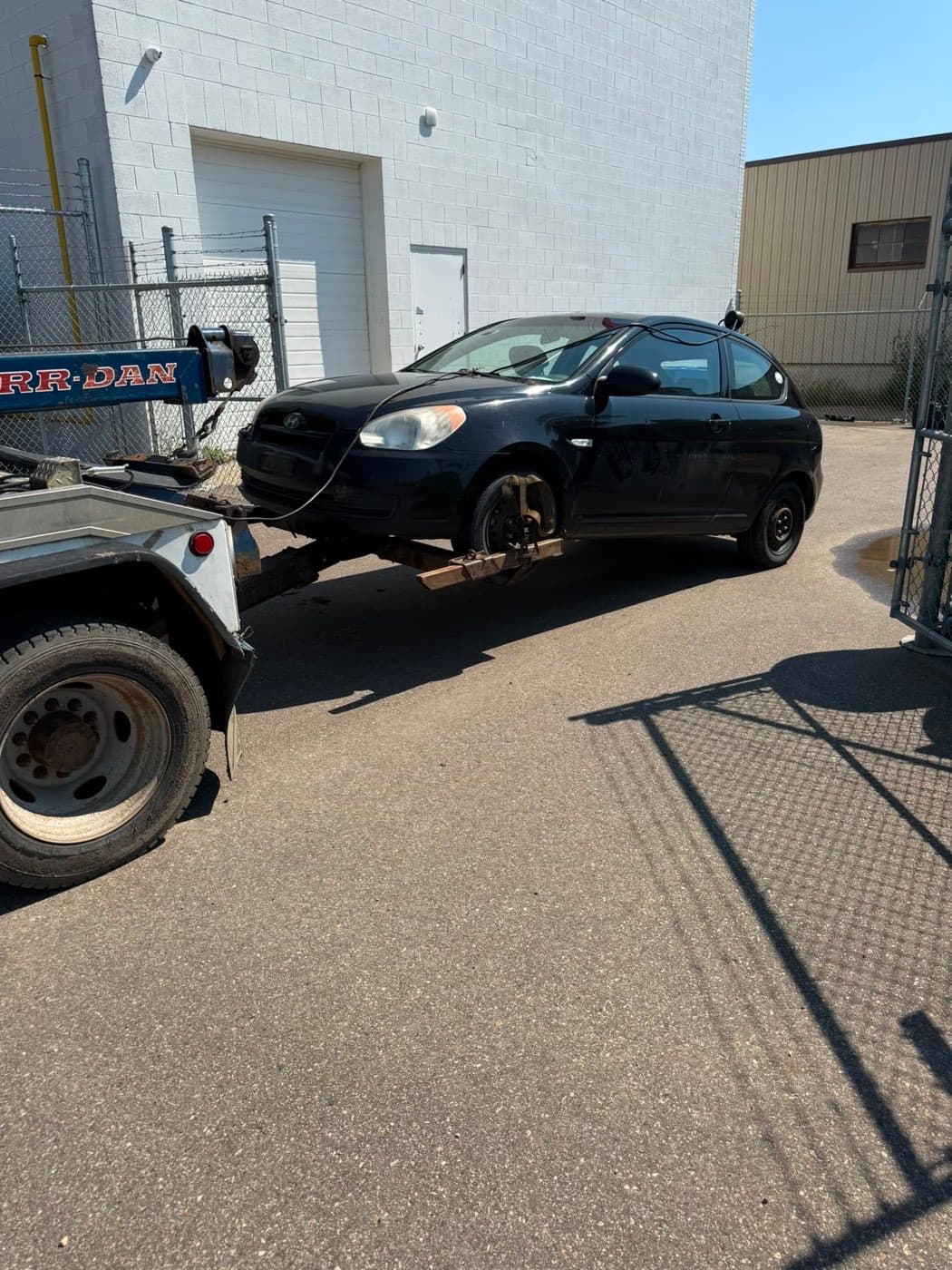 Black 2007 Hyundai Accent collected for cash in Prince Rupert, Edmonton