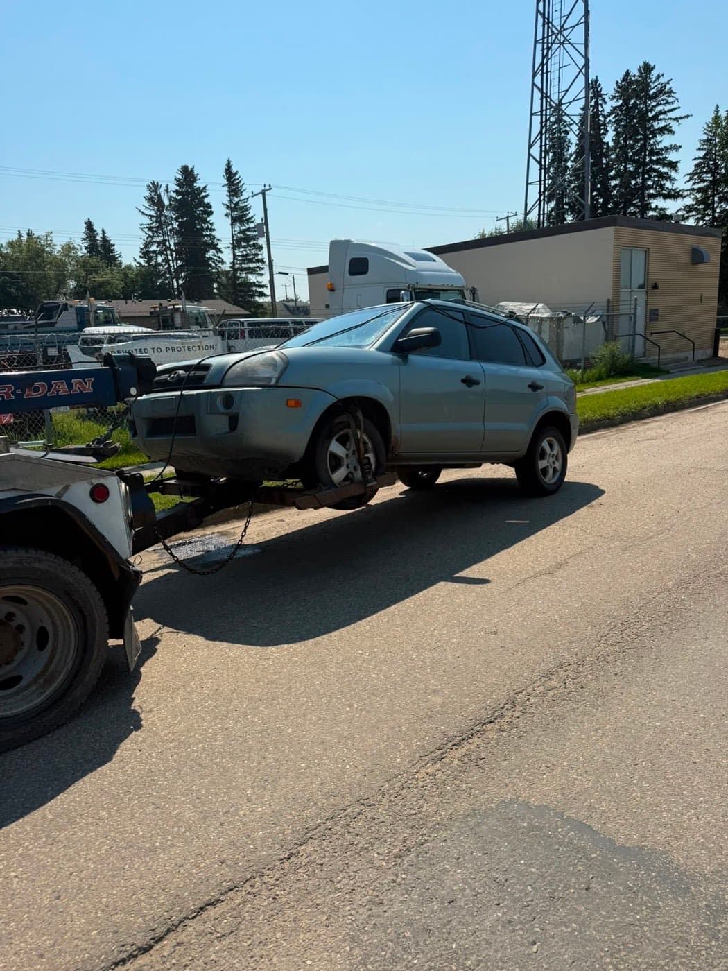 Silver 2007 Hyundai Tucson collected for cash in downtown Thorsby, Alberta