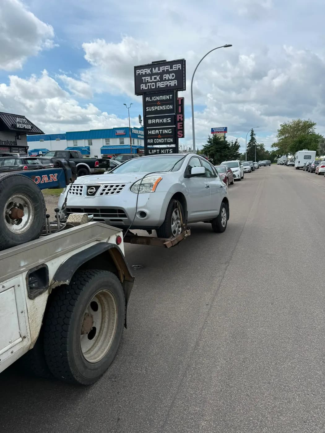 Silver 2010 Nissan Rogue collected for cash in Village on the Lake, Sherwood Park