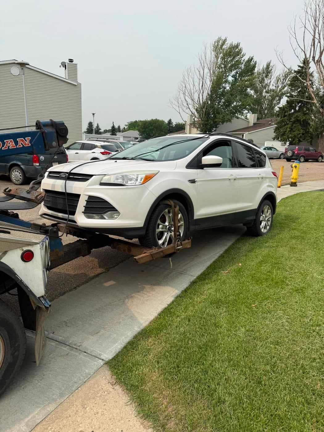 White 2014 Ford Escape collected for cash in Satoo, Edmonton